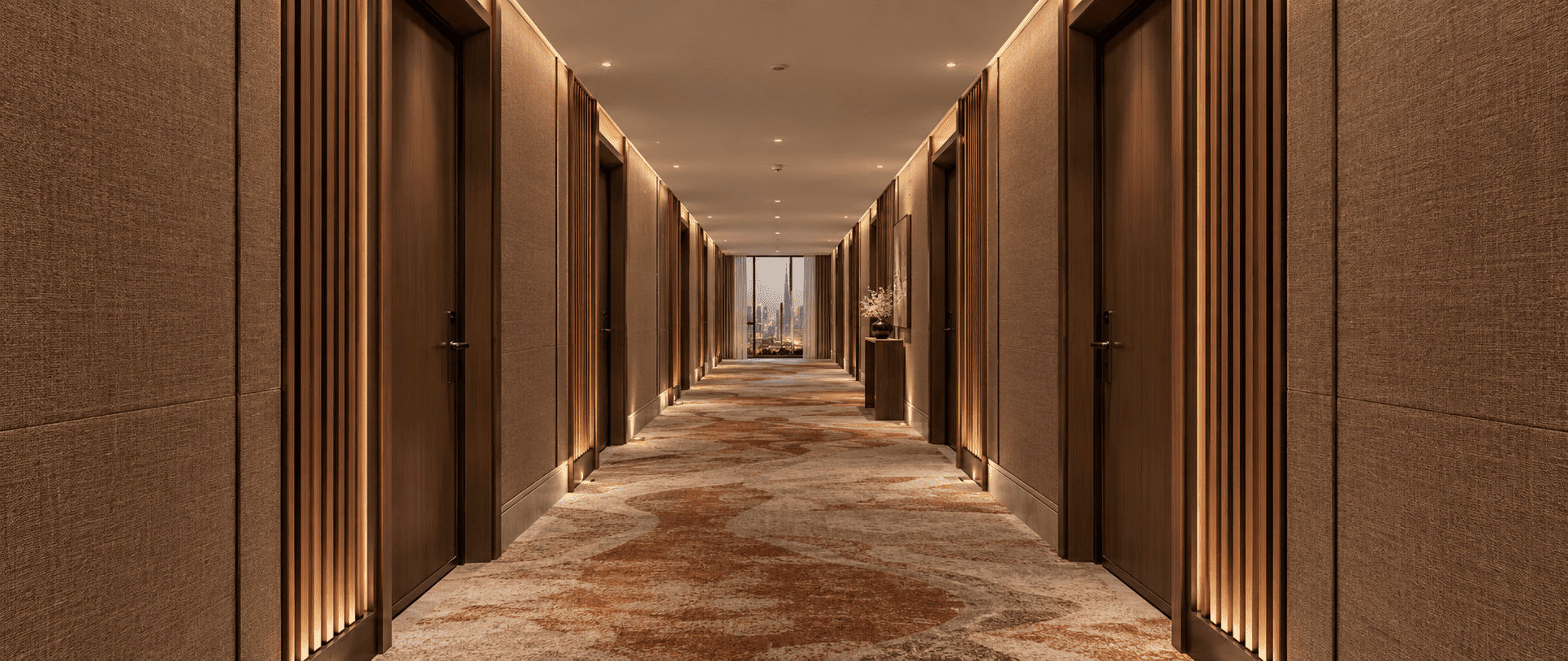 Hotel guestroom corridor in Dubai with acoustically treated partitions and sealed room doors