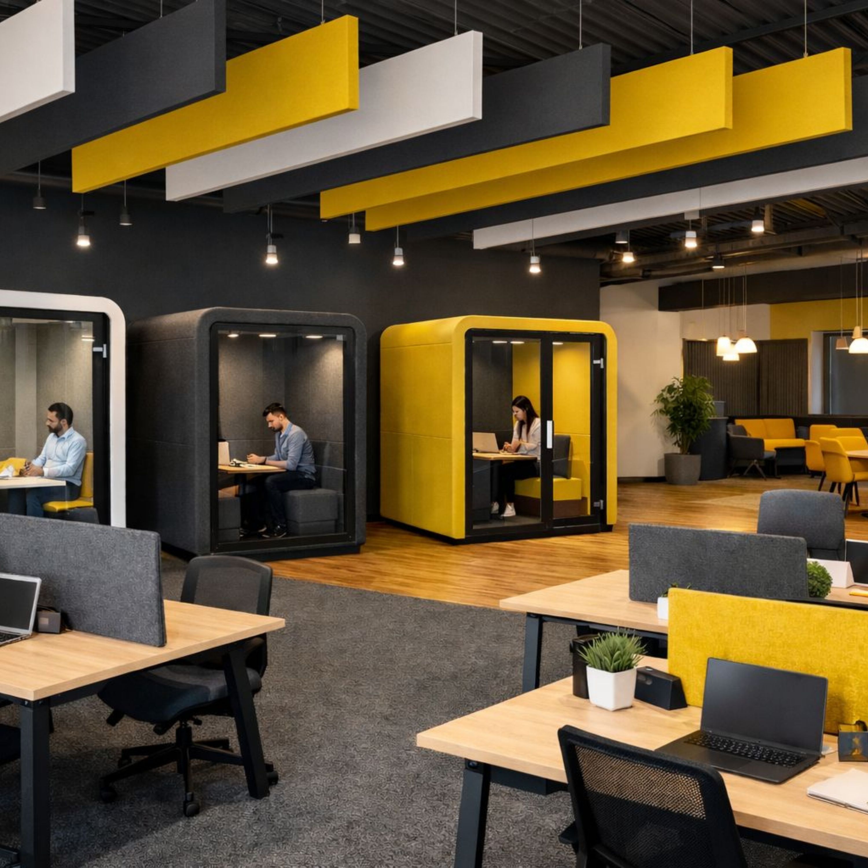 Acoustic treatment in an open-plan office and conference room